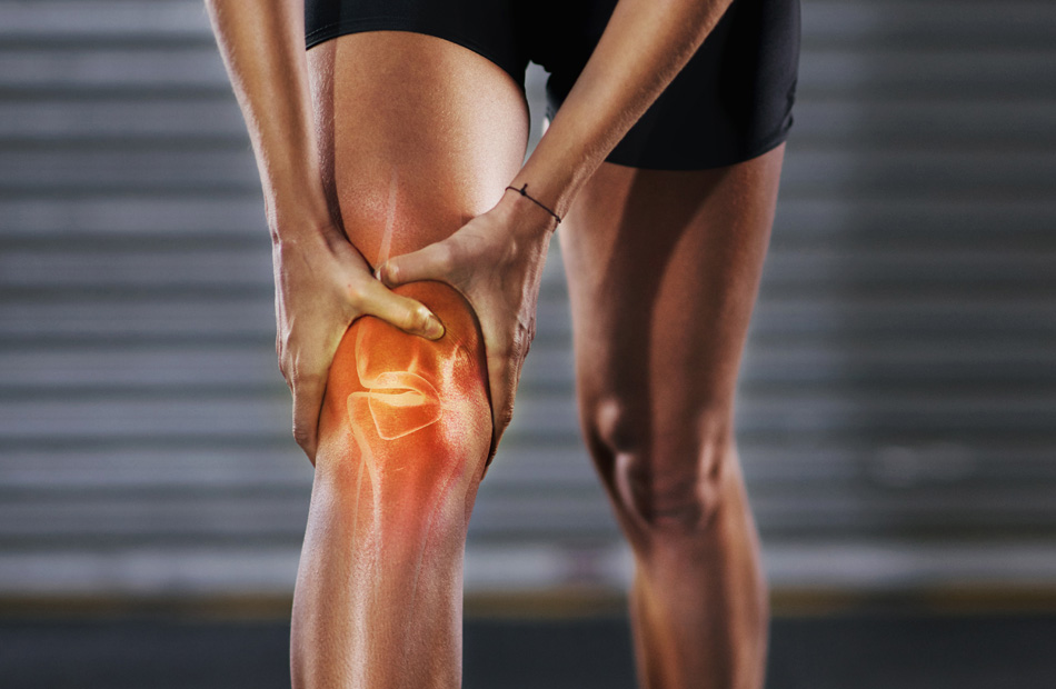 Person holding knee with joint pain